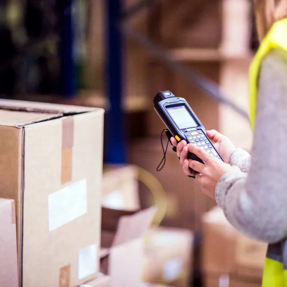 warehouse-woman-worker-with-barcode-scanner-2021-08-26-12-07-57-utc